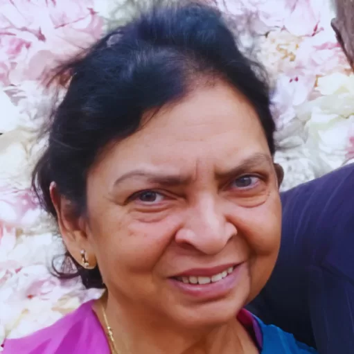 An image of grandma Krishnaveni Pandaram in a beautiful pink and blue saree